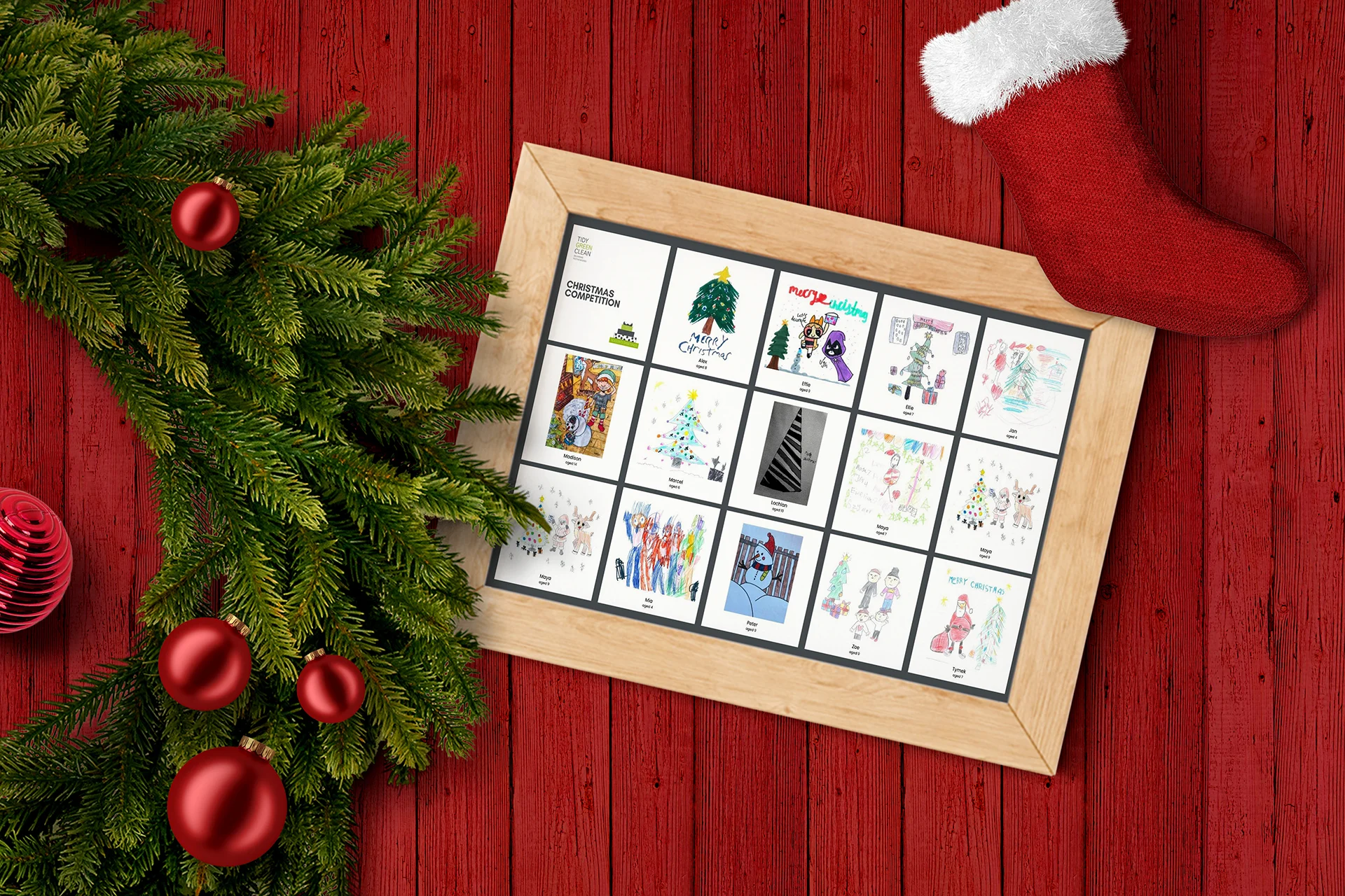Christmas cards design contest on wooden table with decorations